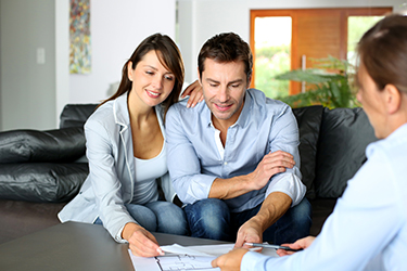 couple looking at plans.